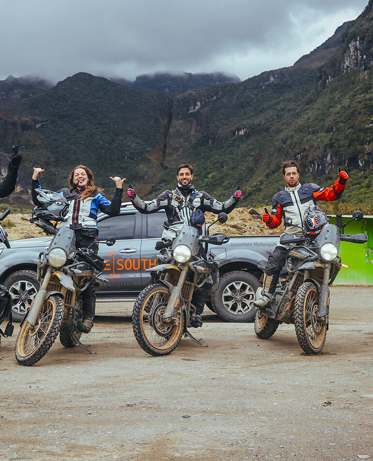 Group of Motorcycle riders posing for a photo during the coffee experience motorcycle tour in Colombia